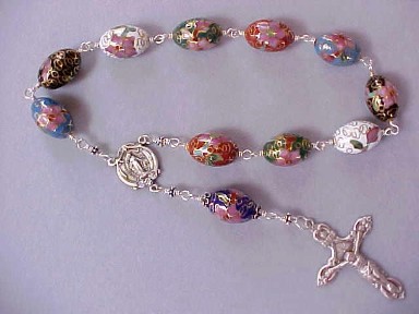handmade Easter chaplets with cloisonné egg beads, wire wrapped in sterling silver with sterling silver crucifix and center