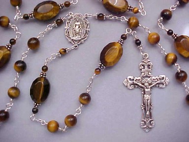 Sterling wire wrapped tiger eye gemstone rosary with large oval our Fathers, all sterling silver wire wrapped construction, sterling crucifix and center Sterling wire wrapped tiger eye gemstone rosary with large oval our Fathers, all sterling silver wire wrapped construction, sterling crucifix and center