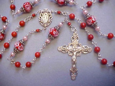Red Coral rosary with red lampworked glass with pink flowers, capped in Bali Silver, sterling silver wire wrapped 