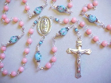 handmade sterling silver Our Lady of Guadalupe rosary with pink coral and lampworked glass handmade sterling silver Our Lady of Guadalupe rosary with pink coral and lampworked glass