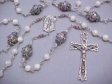 handmade wire wrapped Our Lady of Lourdes rosary with Mother of Pearl, blue lampworked glass with pink roses and sterling silver wire wrapped construction handmade wire wrapped Our Lady of Lourdes rosary with Mother of Pearl, blue lampworked glass with pink roses and sterling silver wire wrapped construction