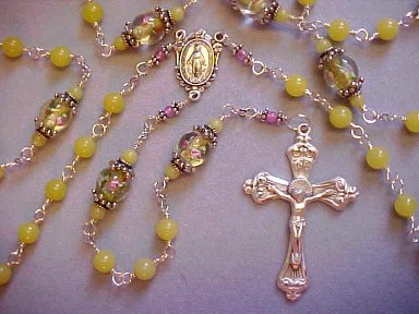 handmade sterling silver wire wrapped rosary with Peridot jade and lampworked glass