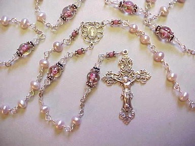 Girl's small mauve pearl rosary with floral glass, filigree sterling silver crucifix and center medal, all sterling wire wrapped construction Girl's small mauve pearl rosary with floral glass, filigree sterling silver crucifix and center medal, all sterling wire wrapped construction