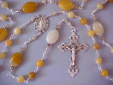 handmade sterling silver wire wrapped rosary with golden jade round beads and golden quartzite oval Our Father beads handmade sterling silver wire wrapped rosary with golden jade round beads and golden quartzite oval Our Father beads